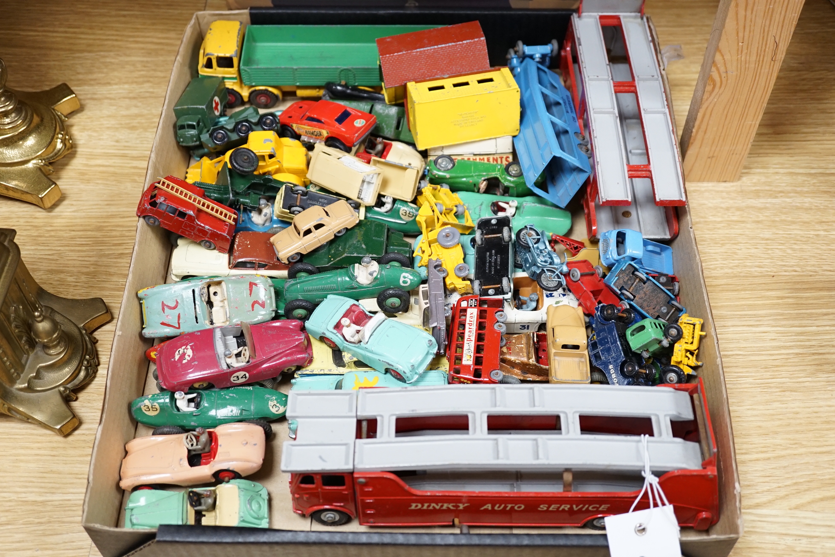 A collection of Dinky Toys, Matchbox Series diecast vehicles, including Dinky Auto Service Car Carrier and trailer, Leyland Octopus, MG Midget, Aston Martin, etc. (approx 80+)